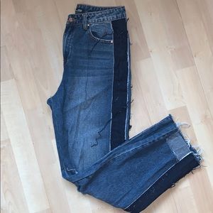 Distressed denim jeans